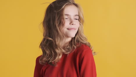 teenage caucasian girl posing in front of the camera.