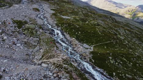 Orbit-drone-shot-to-the-"Panoramabrücke"-a-famous-suspension-bridge-with-a-stunning-view-of-Schlegeis-Stausee-belo