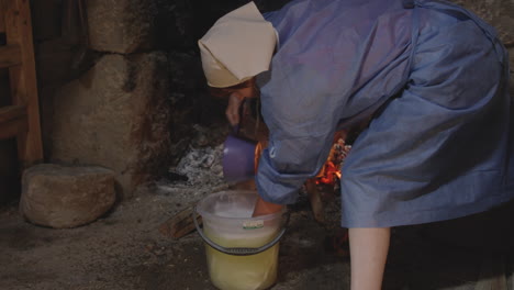 Women-makes-string-cheese-by-hand,-food-heritage,-Chobareti,-Georgia,Medium-shot