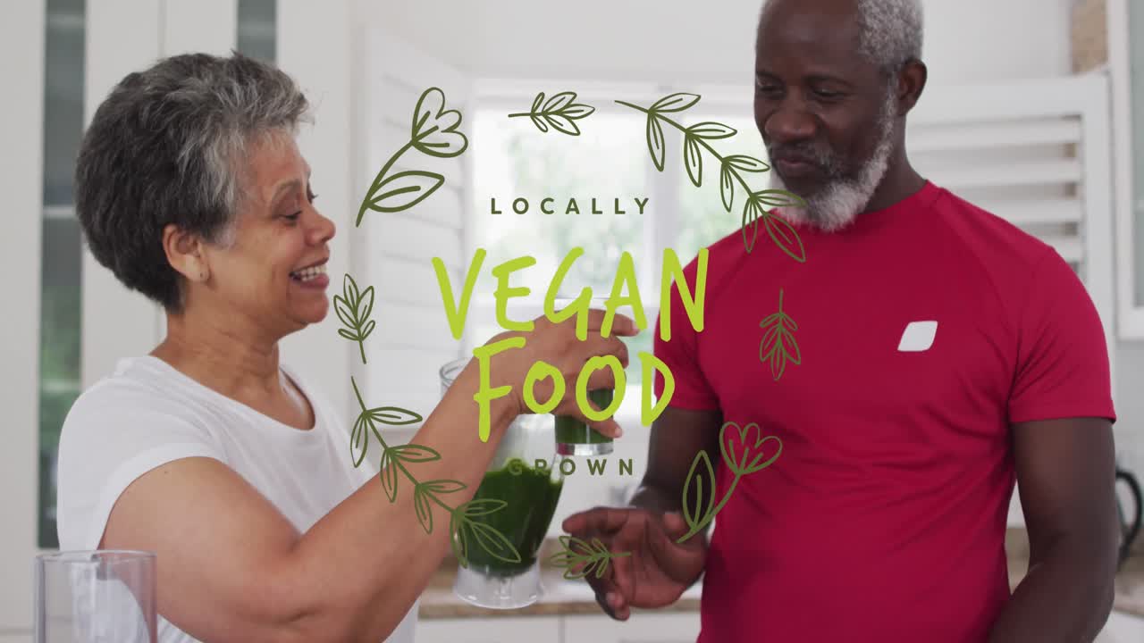 Animation of vegan food text over senior african american couple with healthy drink