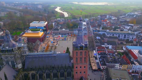 Noord-Brabant-capital-'s-Hertogenbosch-aerial-orbit-over-historic-heart-and-cathedral