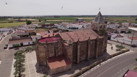 Aerial:-Parroquia-De-Santiago-Apóstol-In-Torremayor-Village,-Spain