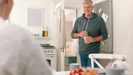 senior couple eating a healthy breakfast together