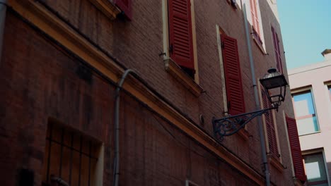 old building with red shutters and modern architecture