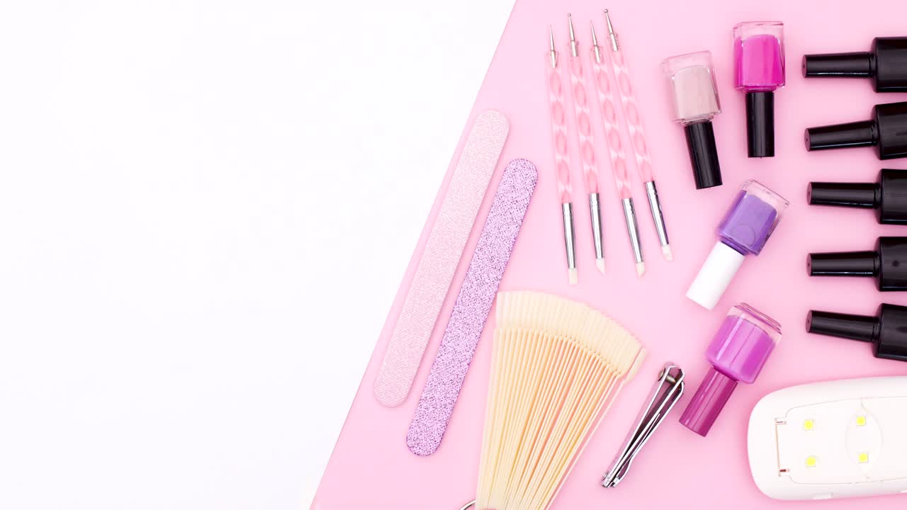 Manicure tools moving on pink side of pink white theme. Stop motion