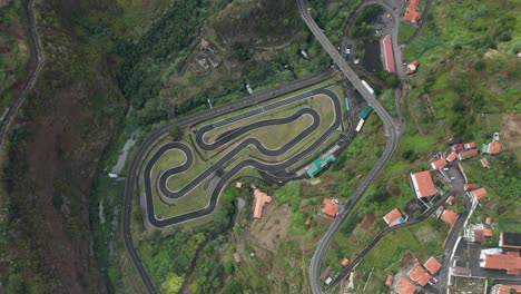 go kart circuit in green valley in madeira island of portugal, top down aerial