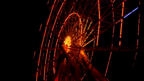 luces de la rueda gigante por la noche