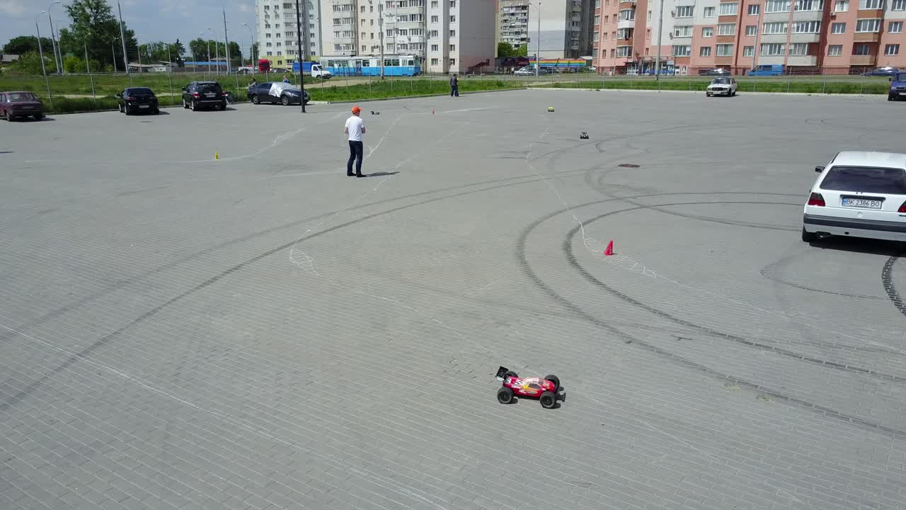 Road Race For Radio Controlled Car. VINNITSA, UKRAINE - MAY 2017: Europe Day, participants in the competition for racing radio-controlled cars