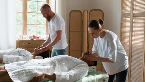 two clients getting a couple massage