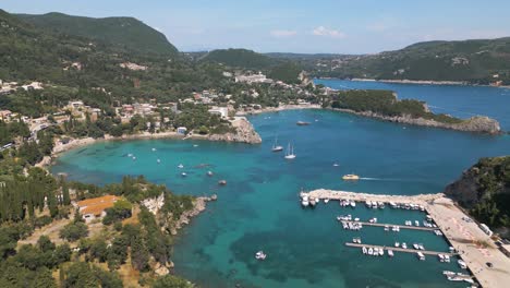 aerial pullback reveals paleokastritsa in corfu, greece