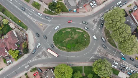 Stationary-overhead-aerial-shot-of-a-busy-roundabout