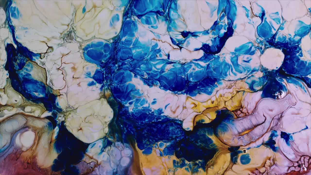 Vibrant Abstract Fluid Art Swirling with Blue and Gold Colors