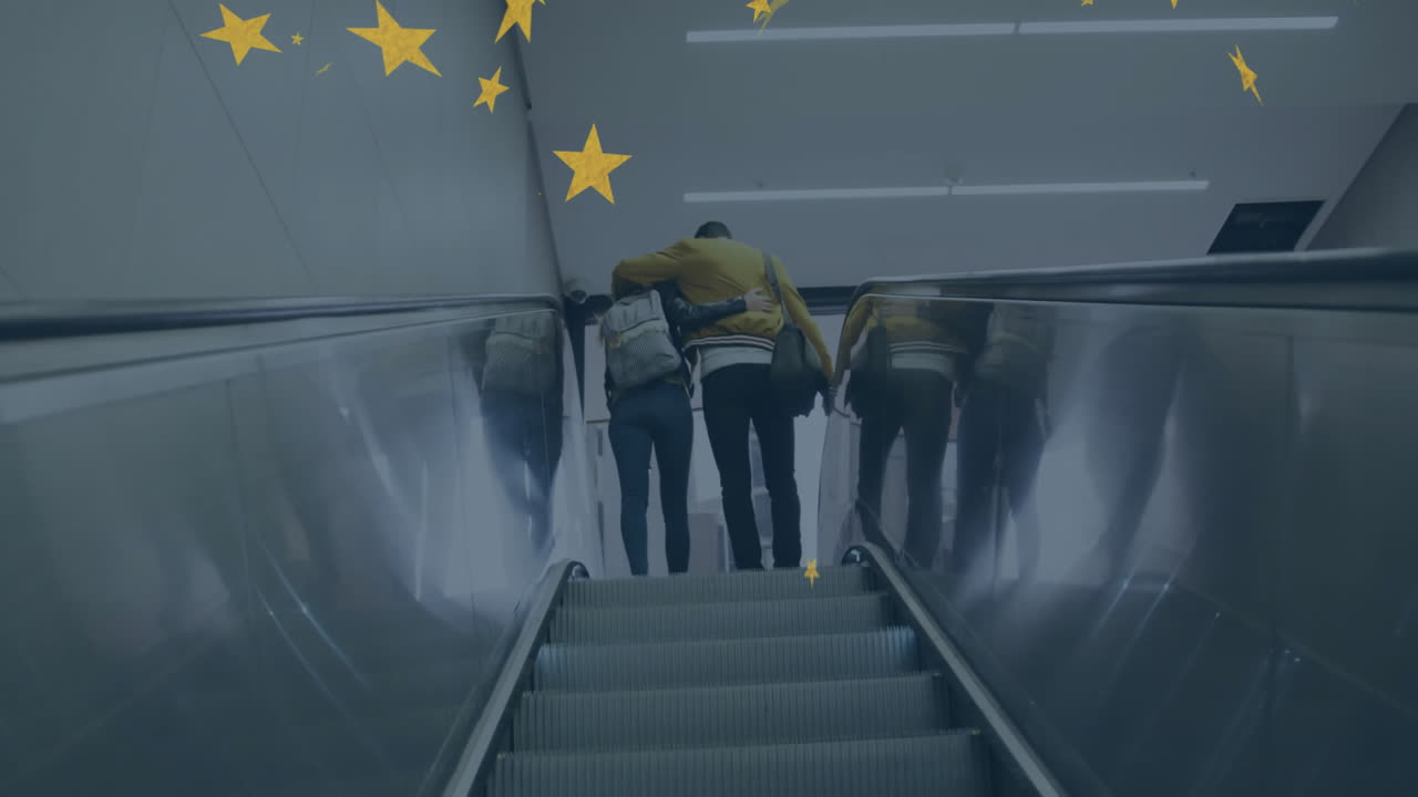 Two people embracing while ascending escalator with star animation overhead