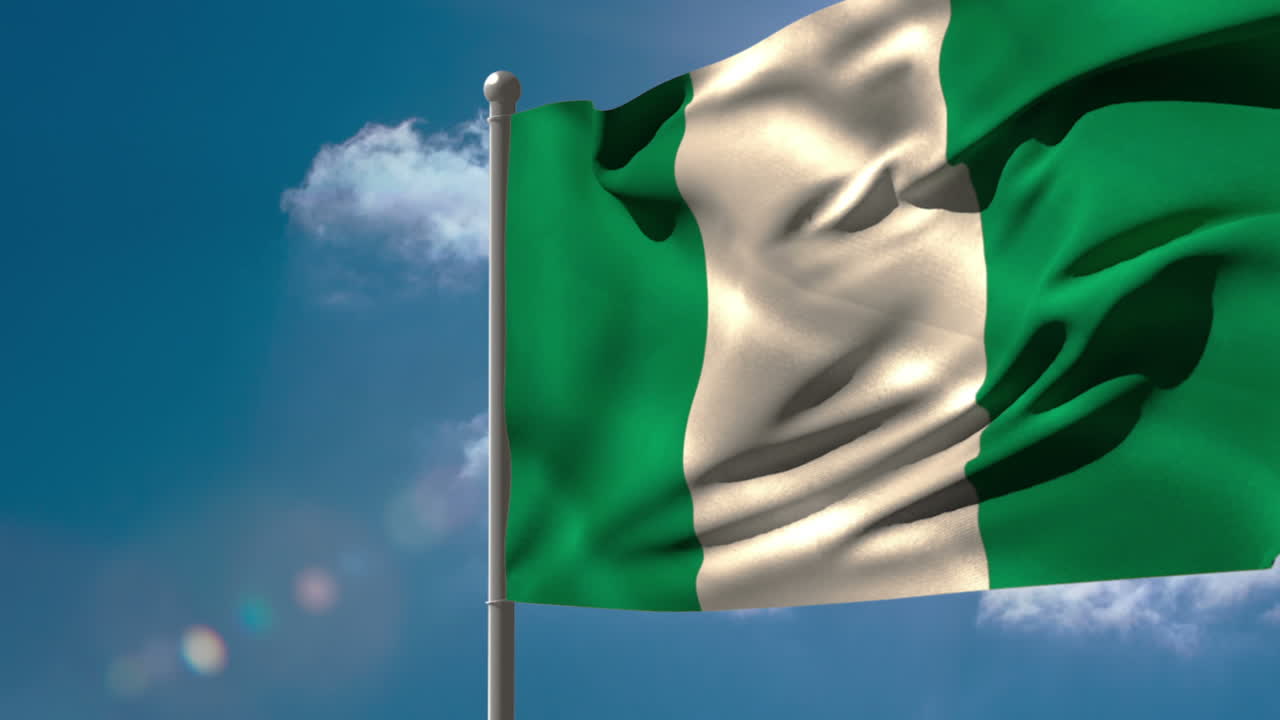 bandera nacional de nigeria ondeando en el mástil de la bandera
