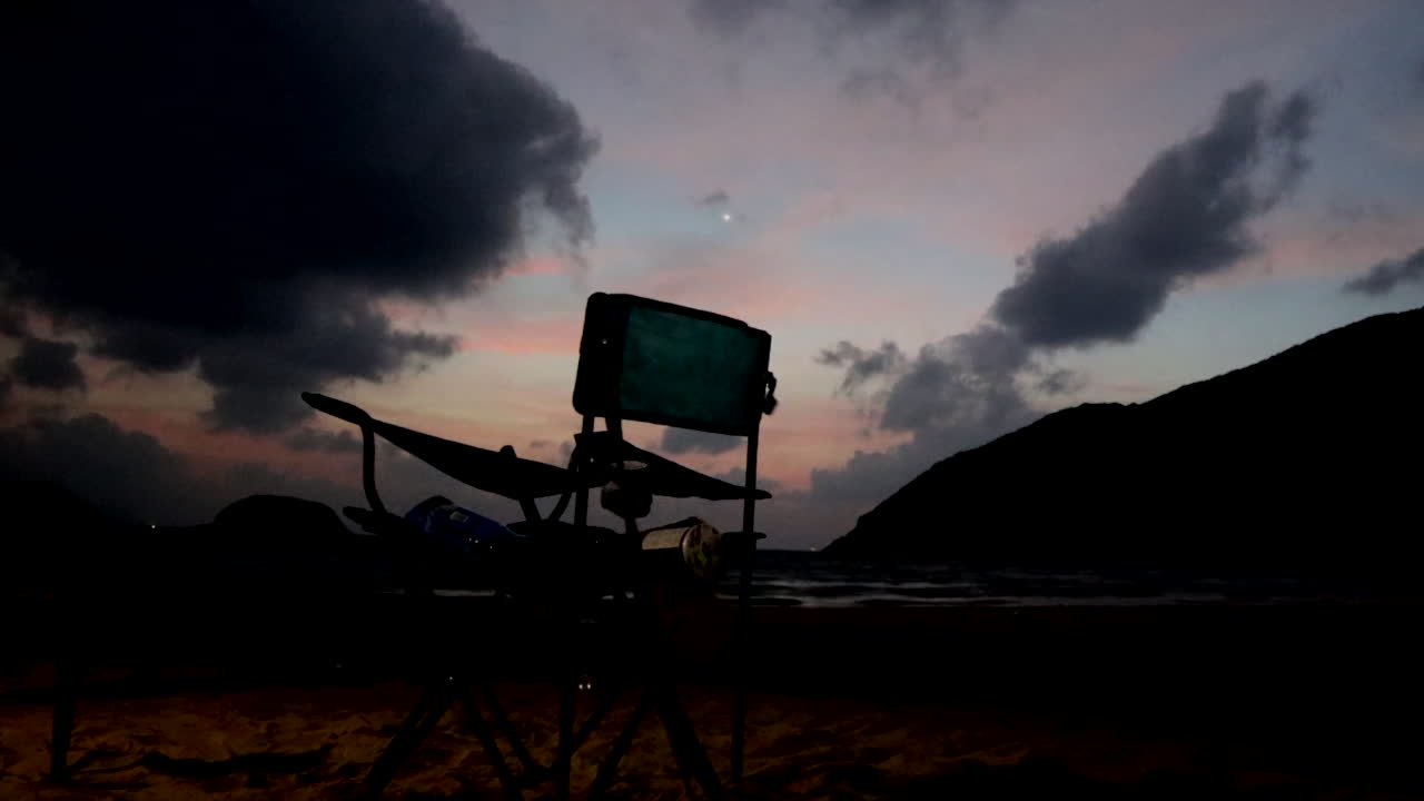 Sunset timlapse with a beach chair shot in SaiKung, Hong Kong, China