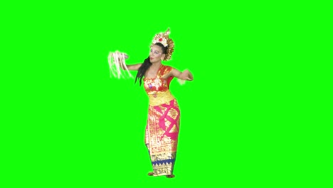 young woman dancing traditional pendet dance