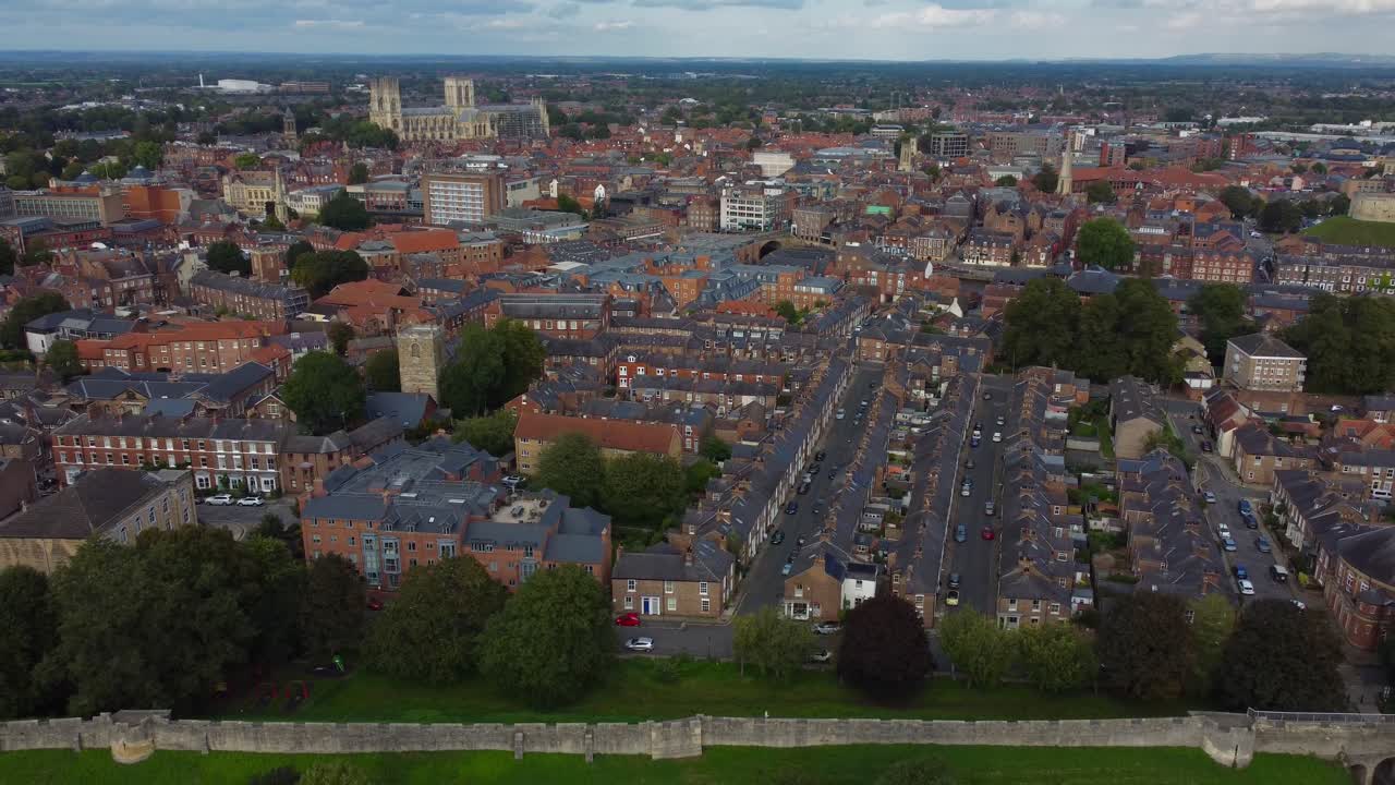Cinematic reveal of York City Walls with York Minster in background - England