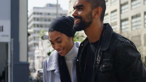 young couple walking on street 4k