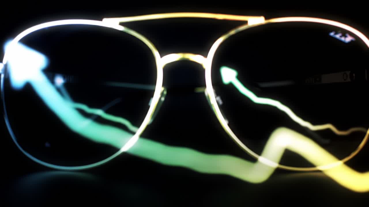 Vibrant Light Trails Dance Across Stylish Sunglasses With a Dark Backdrop in an Artistic Display