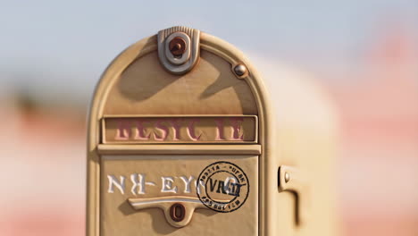 close-up of a stylized beige mailbox