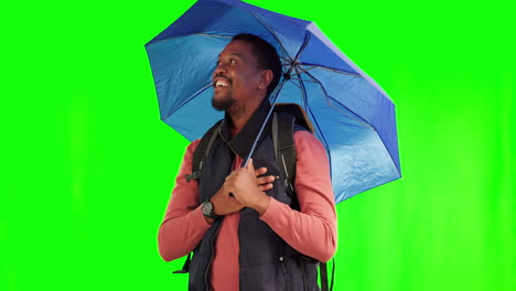 Rain,-travel-and-black-man-with-umbrella-in-green