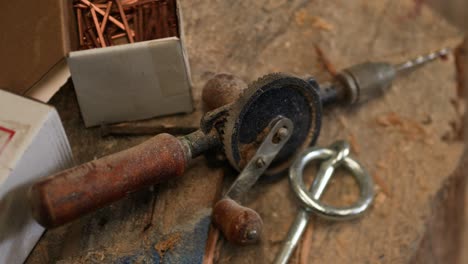vintage hand drill traditional wood and metal tool