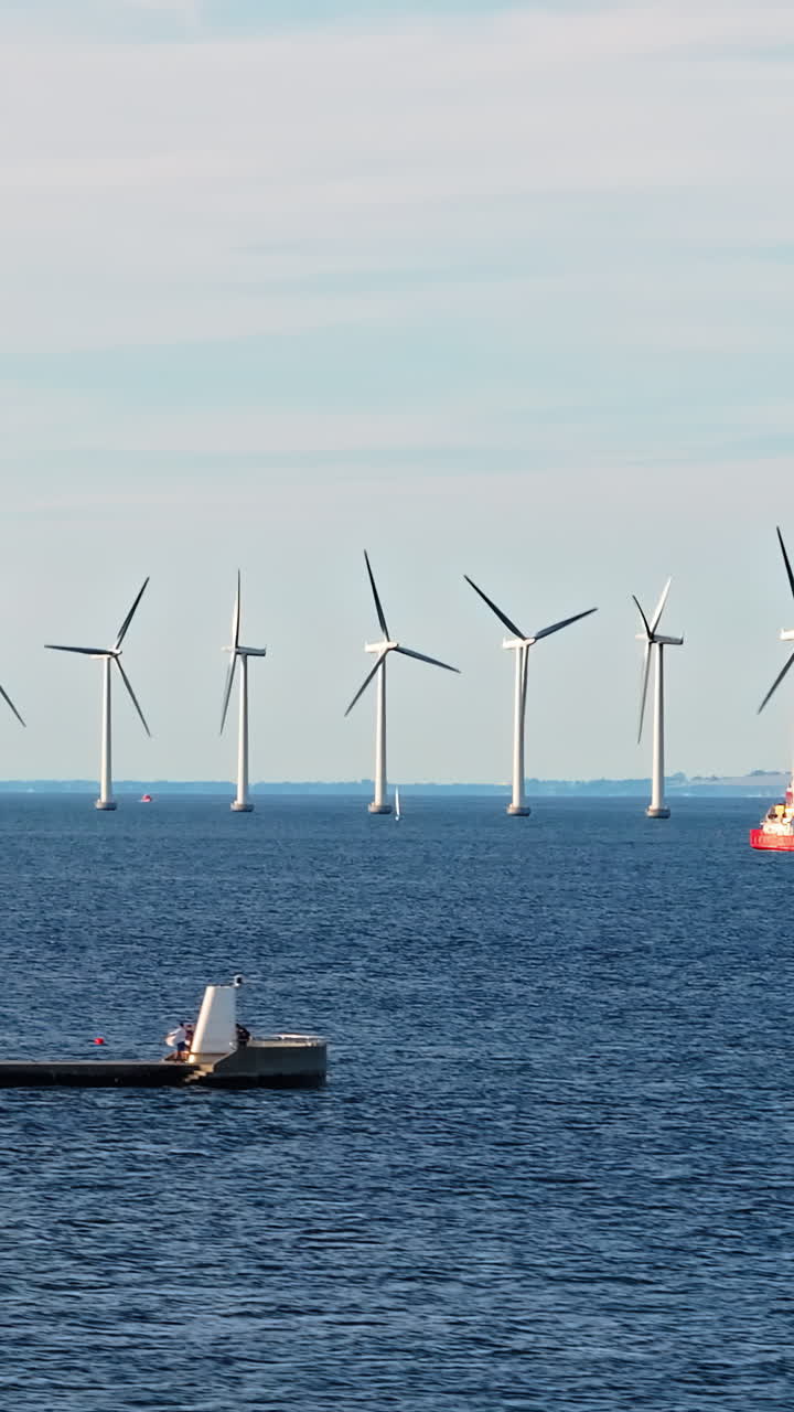 Aerial drone view of the Middelgrunden wind farm outside Copenhagen, Denmark. Vertical