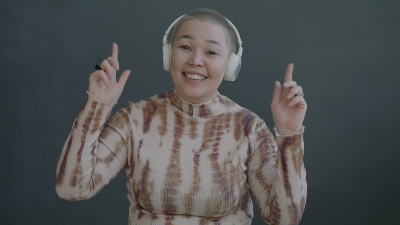 Happy Woman Enjoying Music