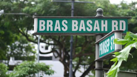 bras basah road sign and buildings