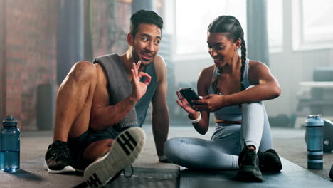 People,-phone-and-talking-fitness-at-gym