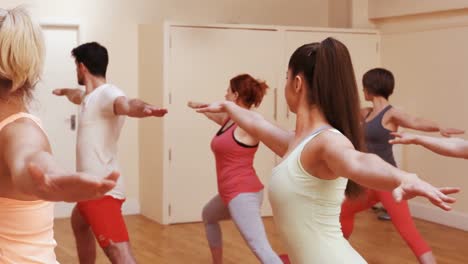 Group-of-people-performing-stretching-exercising