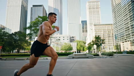 muscular man running in an urban city