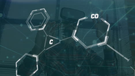 animación de estructuras químicas sobre hombre biracial usando auriculares vr en la oficina