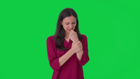 Sick-Indian-woman-having-Hand-pain-Green-screen