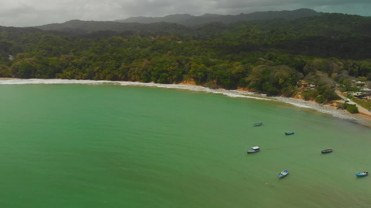 Aerial footage of miles of scenic coastline on the Caribbean island of Trinidad and Tobago