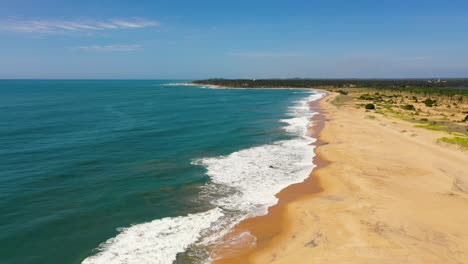 top view of tropical sandy beach and blue ocean.