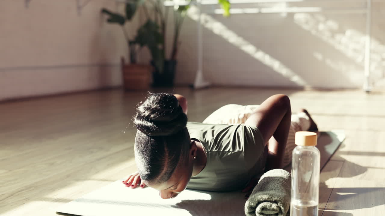Woman doing yoga indoors