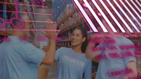 animation of financial data processing over smiling diverse volunteers high fiving in warehouse