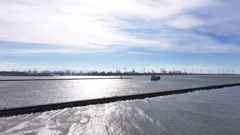 The-NCL-Svelgen-Maneuvering-Through-the-Ship-Canal-at-Hoek-van-Holland-in-the-Netherlands---Aerial-Drone-Shot