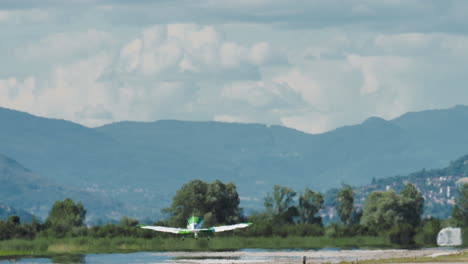 propeller airplane takes off