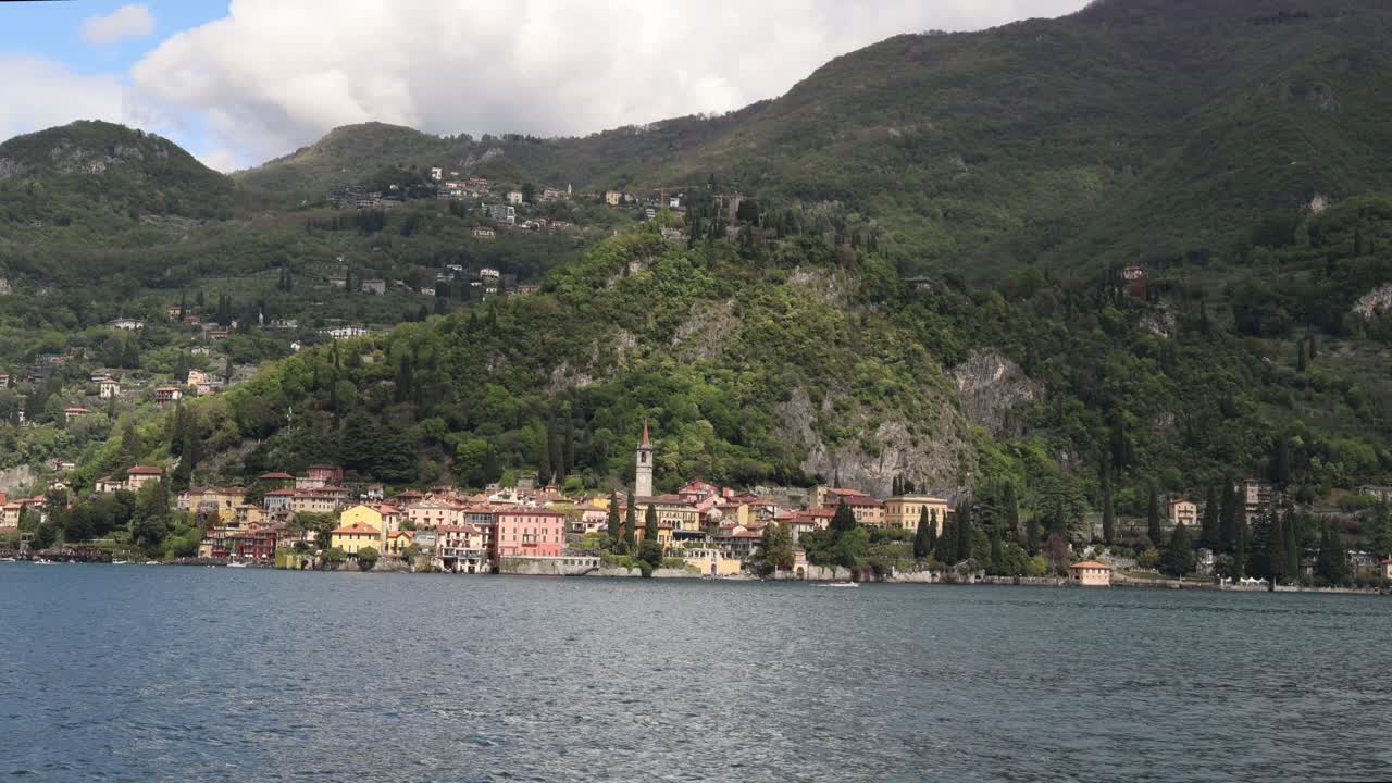 Lake Como with city of Varenna on the shore, wide establisher