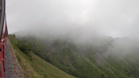 ride on popular tourist attraction brienz rothorn train on cloudy day switzerland