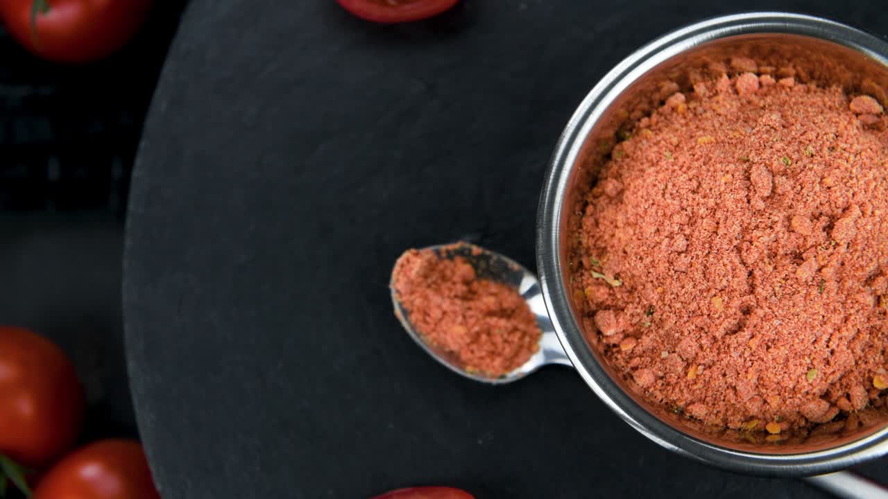 Tomato Powder on a rotating table (seamless loopable)