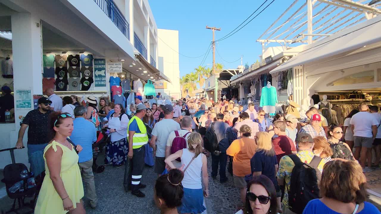 Bustling and Crowded Shopping Street in a Tourist Town