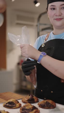 baker preparing cookies in a bakery