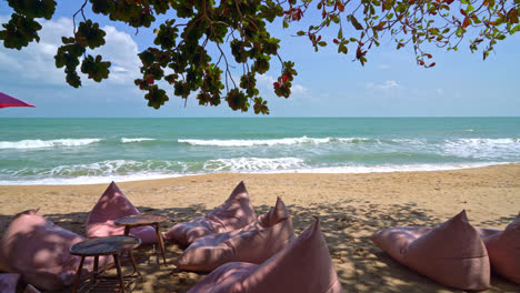 bean bag on beach with ocean sea and blue sky background