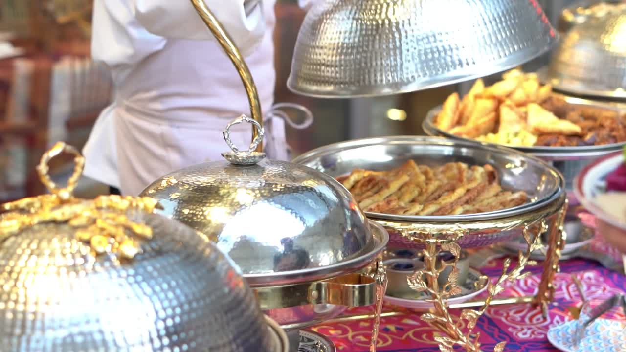 View of food in open buffet, close up shot, high angle shot