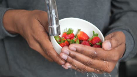 washing strawberries