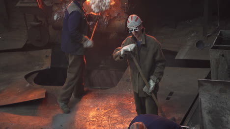 metal workers in a factory