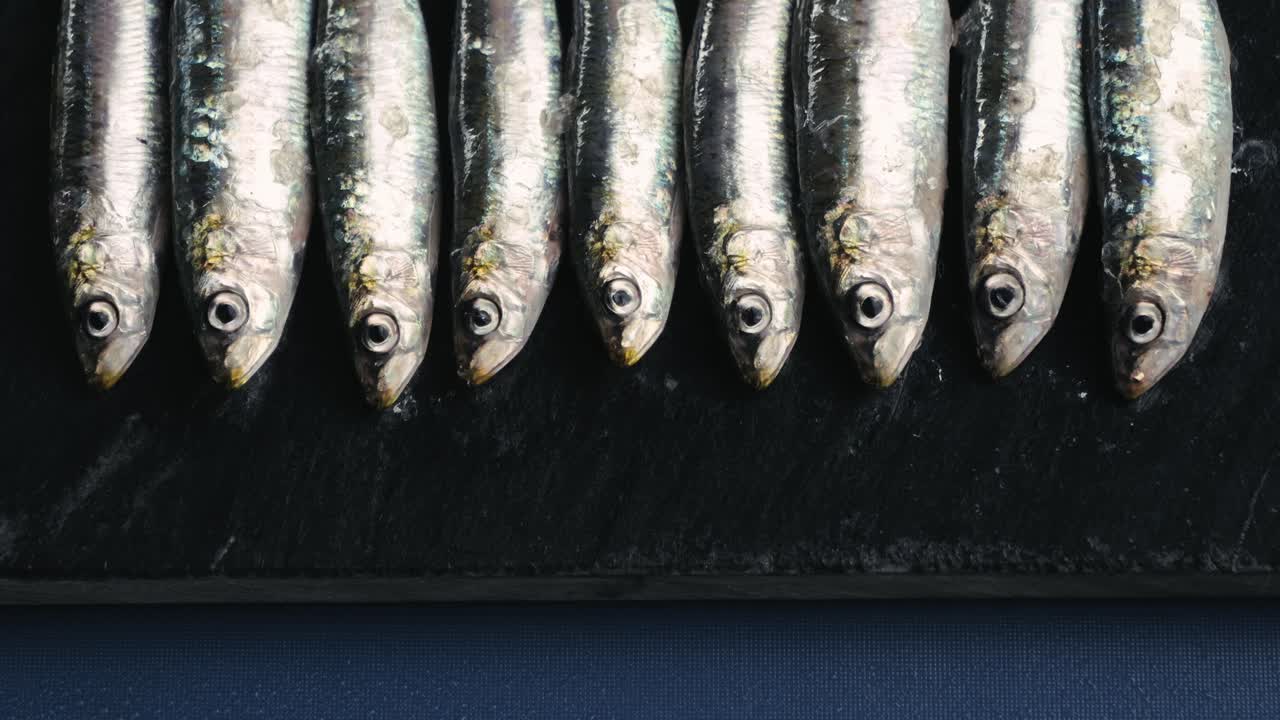 Fresh Sardines on a Cutting Board